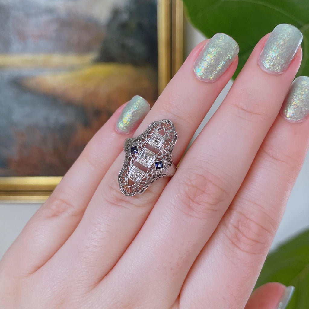 Art Deco 18k White Gold, Diamond, and Sapphire Filigree Shield Dinner Ring - Clover Collective Antiques