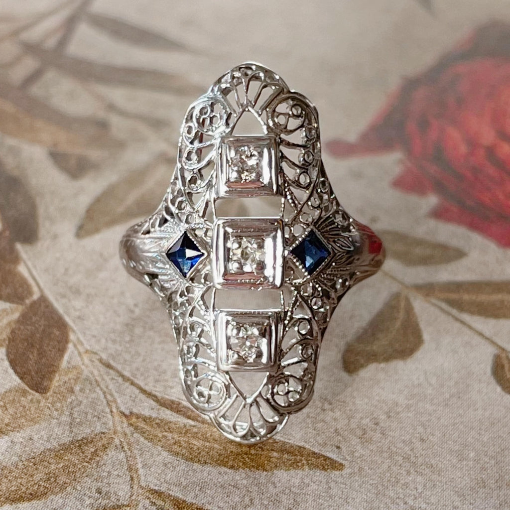 Art Deco 18k White Gold, Diamond, and Sapphire Filigree Shield Dinner Ring - Clover Collective Antiques