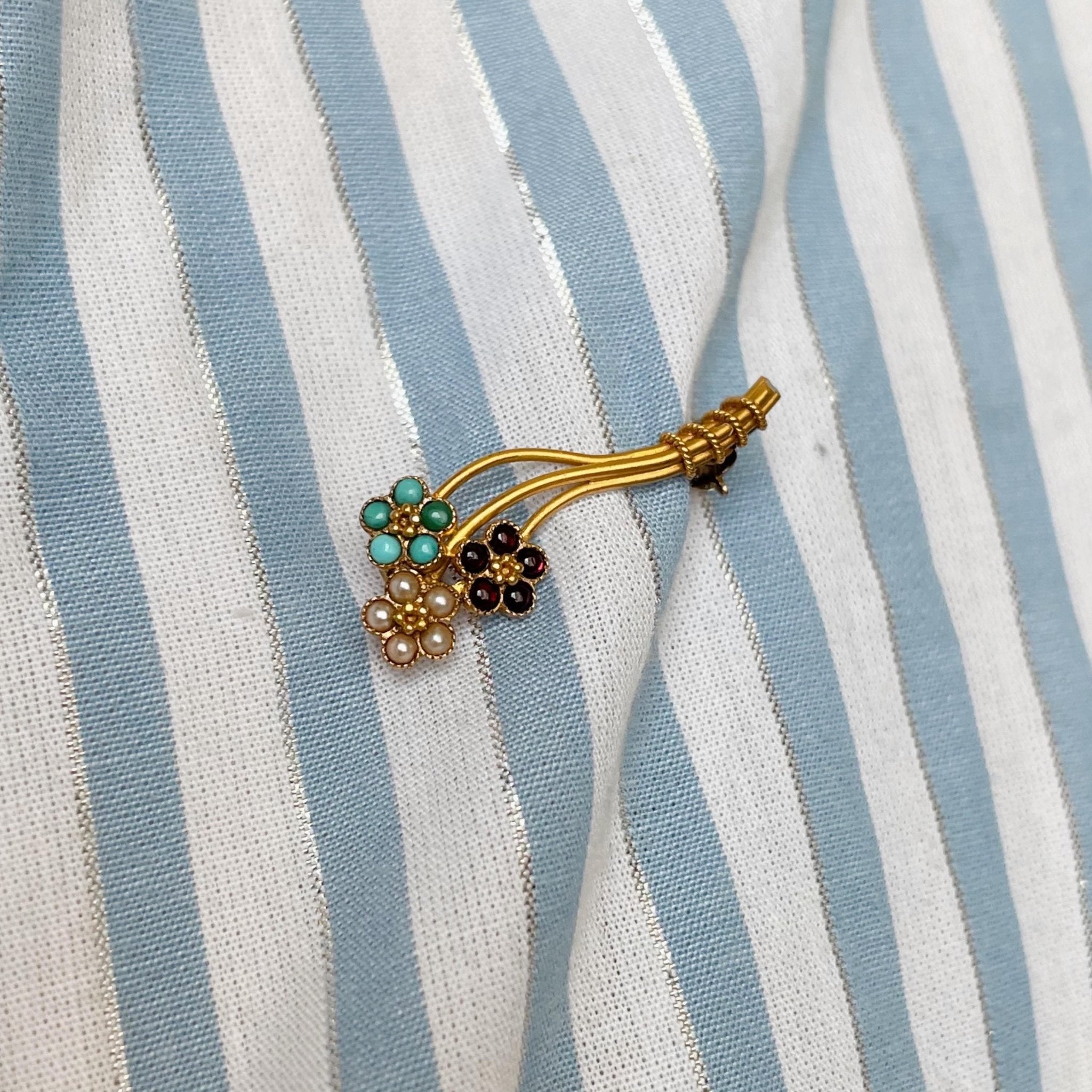 Edwardian 18k Yellow Gold, Garnet, Turquoise, and Pearl Flower Brooch - Clover Collective Antiques
