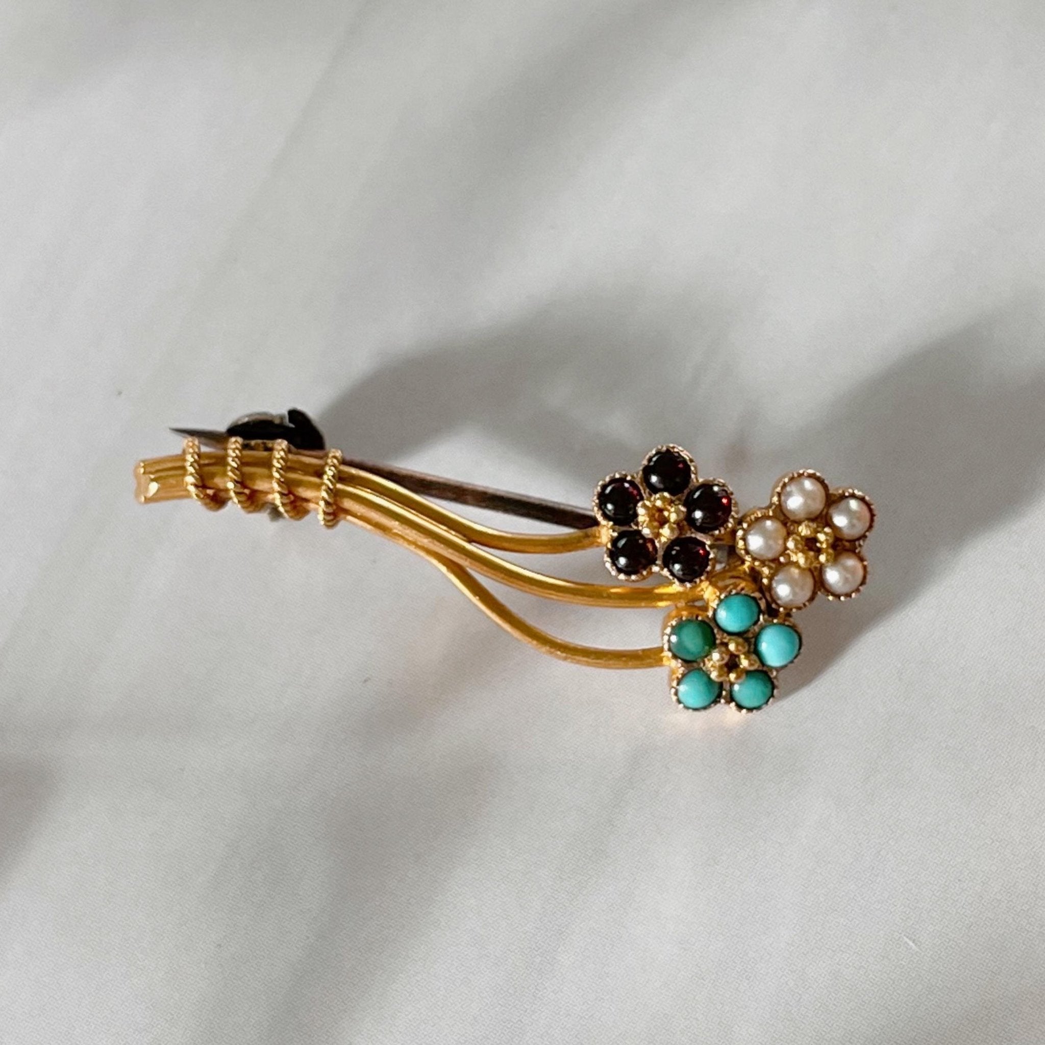 Edwardian 18k Yellow Gold, Garnet, Turquoise, and Pearl Flower Brooch - Clover Collective Antiques