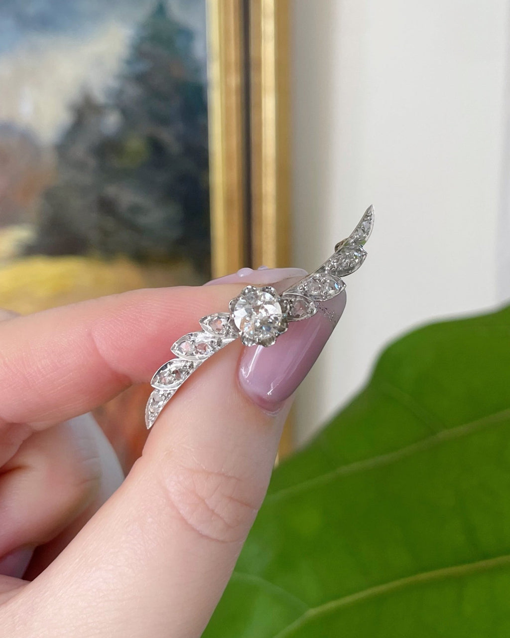 Edwardian Platinum, 14k Rose Gold, and Diamond Winged Brooch - Clover Collective Antiques