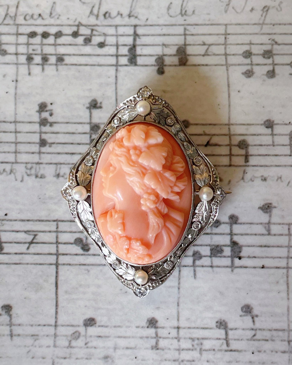 Edwardian Platinum, Diamond, Pearl, and Coral Cameo Brooch - Clover Collective Antiques