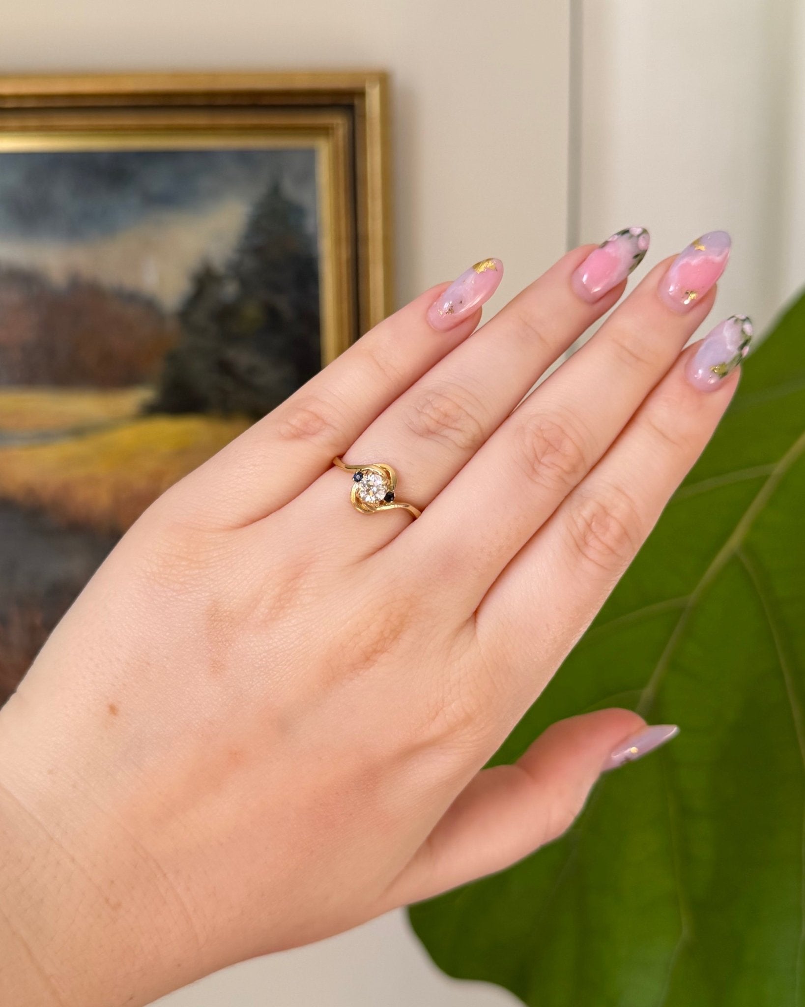 Mid - Century 14k Yellow Gold, Old European Cut Diamond, and Sapphire Bypass Swirl Ring - Clover Collective Antiques