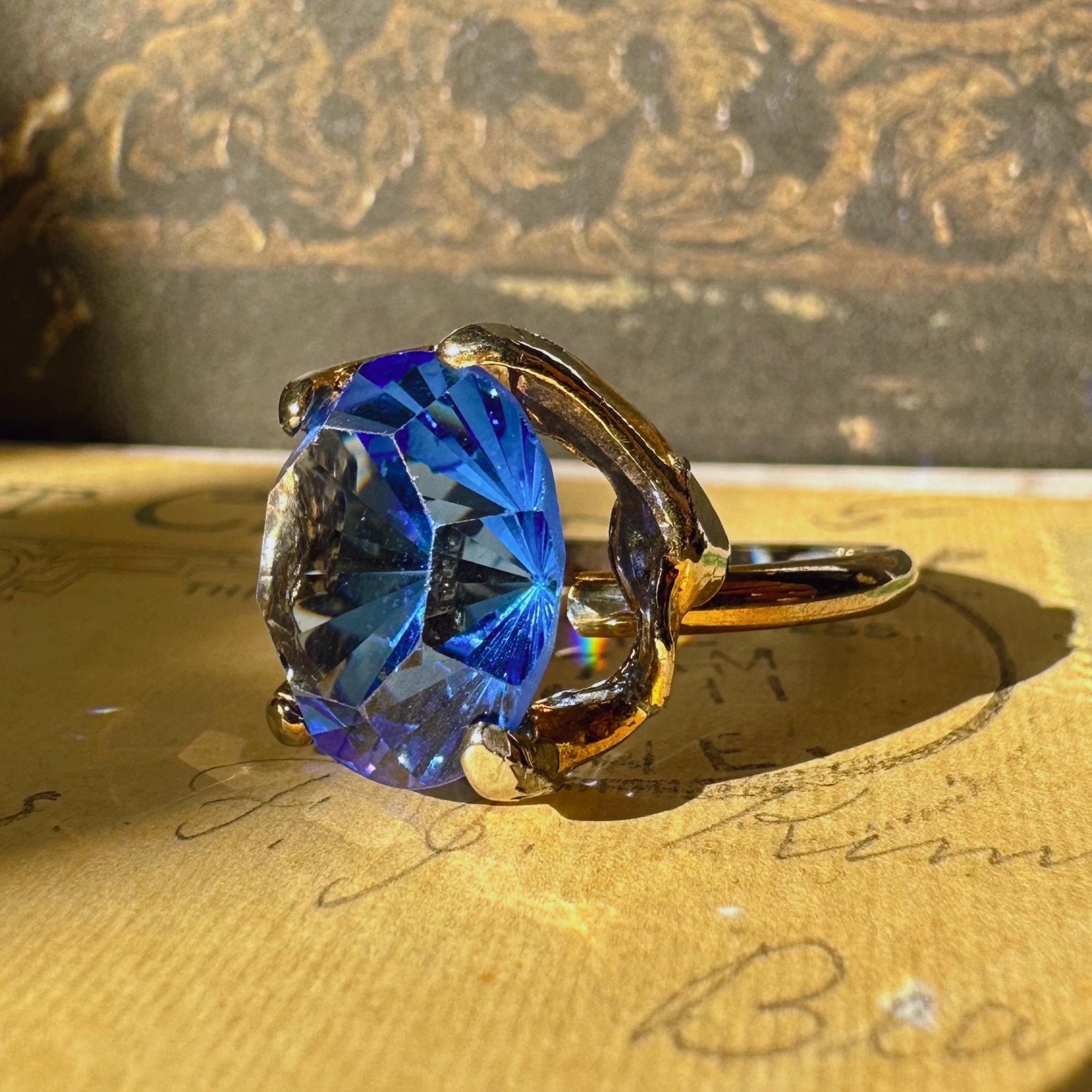 Mid - Century Goldtone and Simulated Sapphire Glass Crystal Adjustable Ring - Clover Collective Antiques