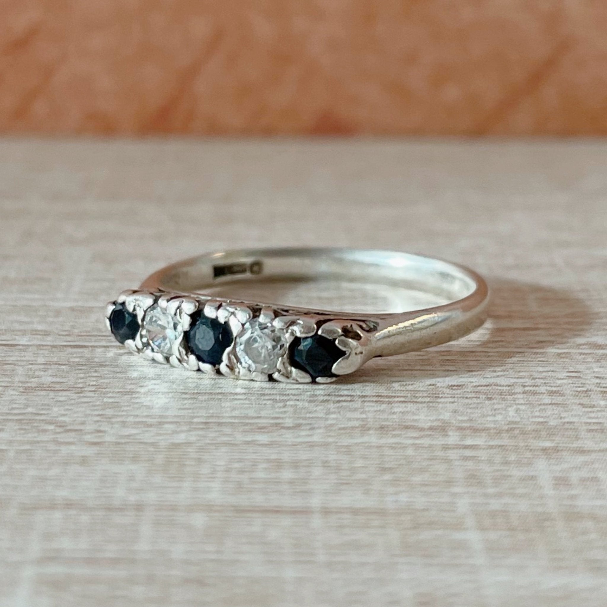 Mid - Century Sapphire, Paste, and Sterling Silver Ring - Clover Collective Antiques