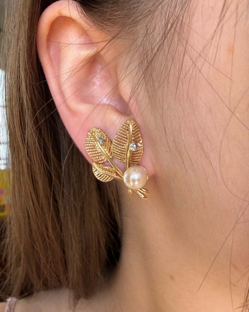 Pair of Mid Century 14k Yellow Gold, Pearl, and Diamond Flora Leaf Ear Clip Earrings - Clover Collective Antiques
