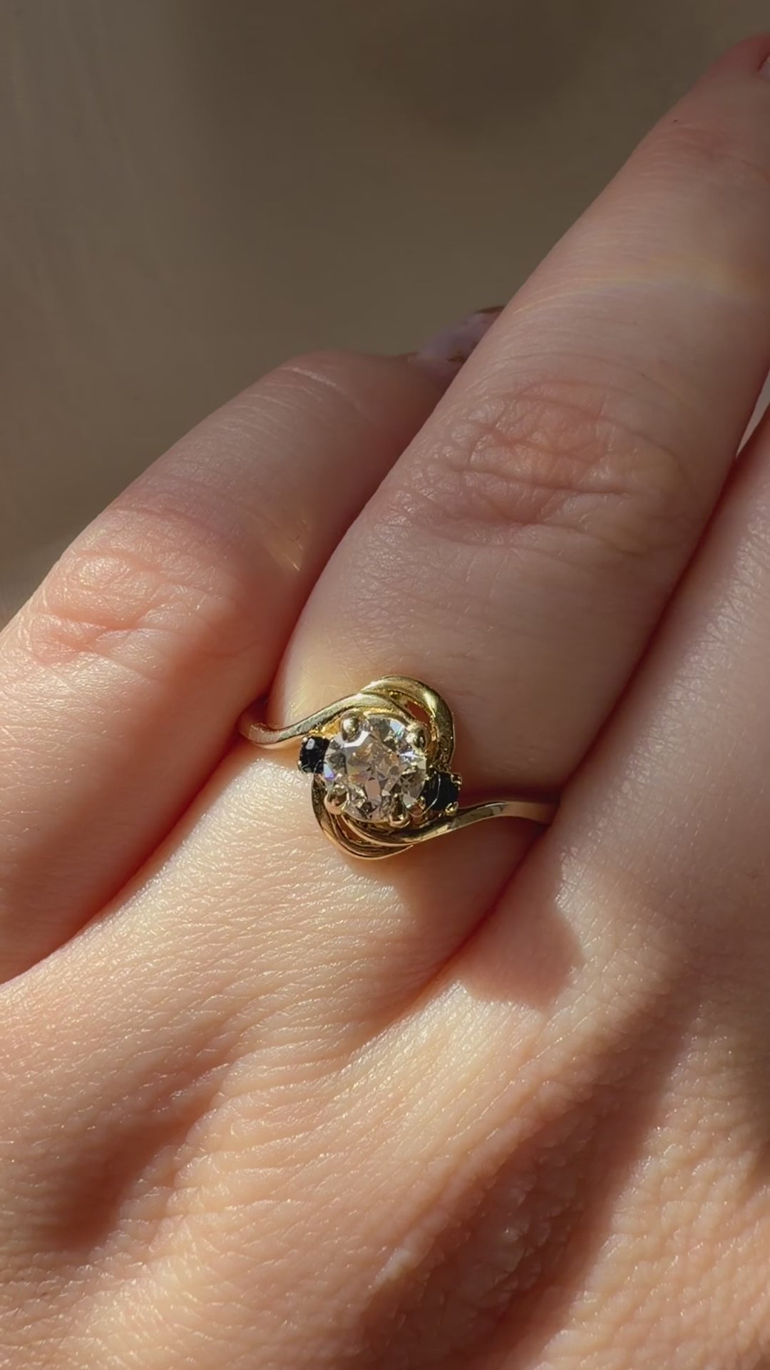 Mid-Century 14k Yellow Gold, Old European Cut Diamond, and Sapphire Bypass Swirl Ring