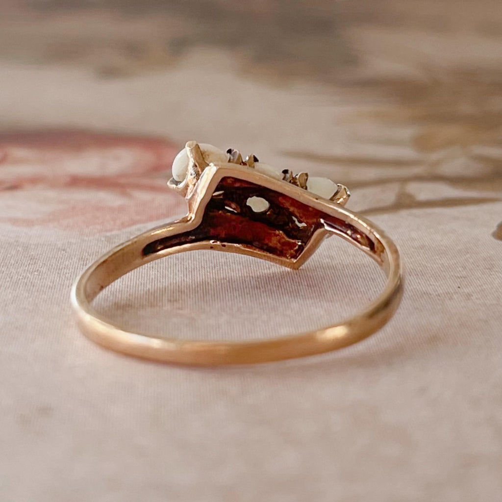 Retro Budlong, Docherty & Armstrong 10k Rose Gold and Opal Three Stone Bypass Ring - Clover Collective Antiques