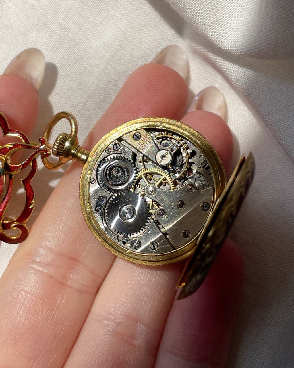 Victorian H. Nathan & Co. Swiss 18k Gold, Diamond, and Guilloche Enamel Pendant Watch - Clover Collective Antiques