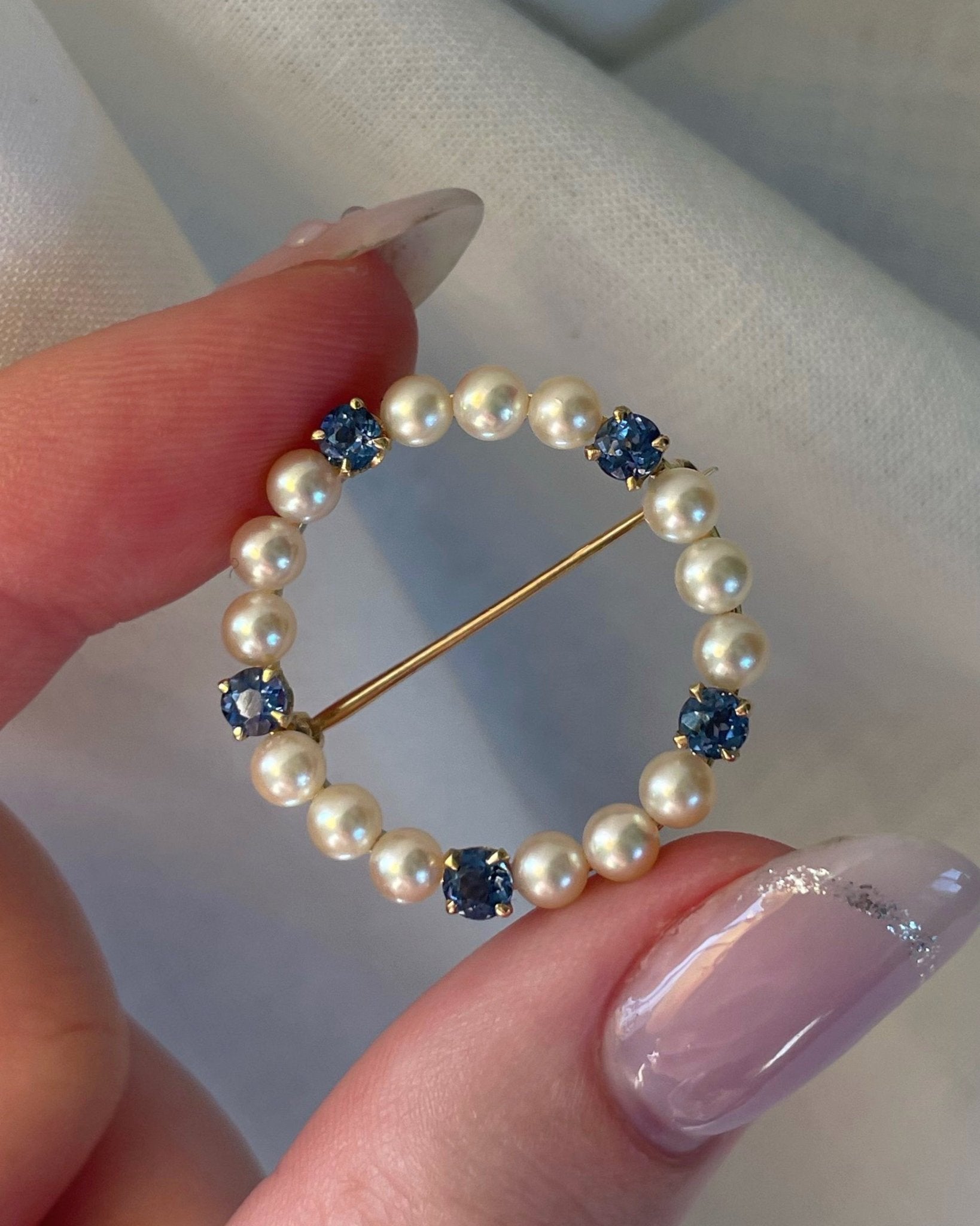 Vintage 14k Yellow Gold, Sapphire, and Pearl Wreath Circle Brooch - Clover Collective Antiques