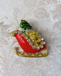 Vintage Gold Tone, Rhinestone, and Enamel Santa Claus and Sleigh Holiday Pin Brooch - Clover Collective Antiques